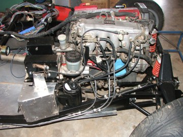 Side view of Engine, going around the filter.